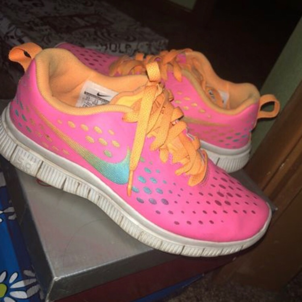 Two pairs (Nike and adidas running shoes)